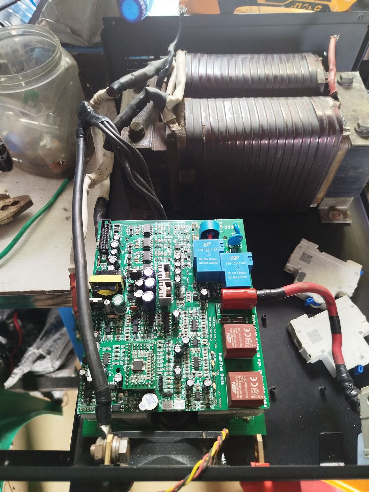 Open inverter chassis showing main board and transformer